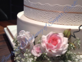 wedding cake flowers and lace